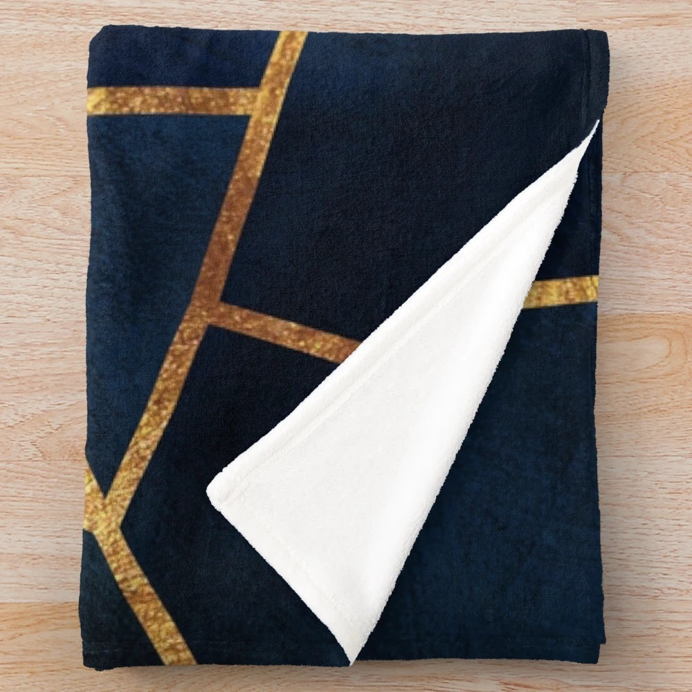 Navy blue and gold geometric pattern plush blanket