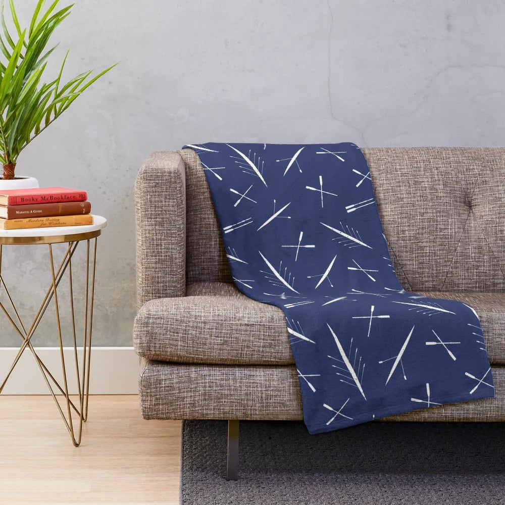Navy blue and white plush blanket with a scull pattern, perfect for rowing enthusiasts