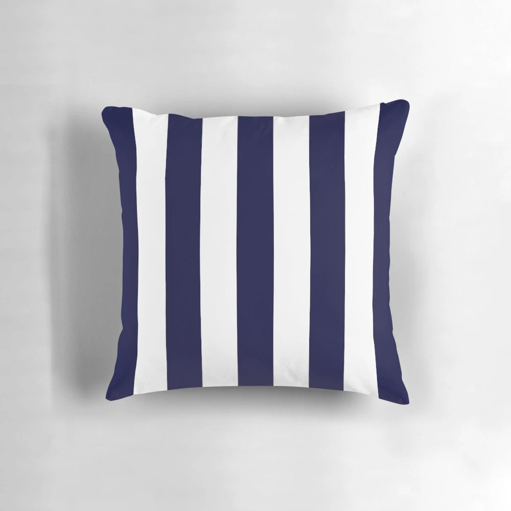 Navy blue and white striped decorative pillow for coastal and beach-inspired home decor