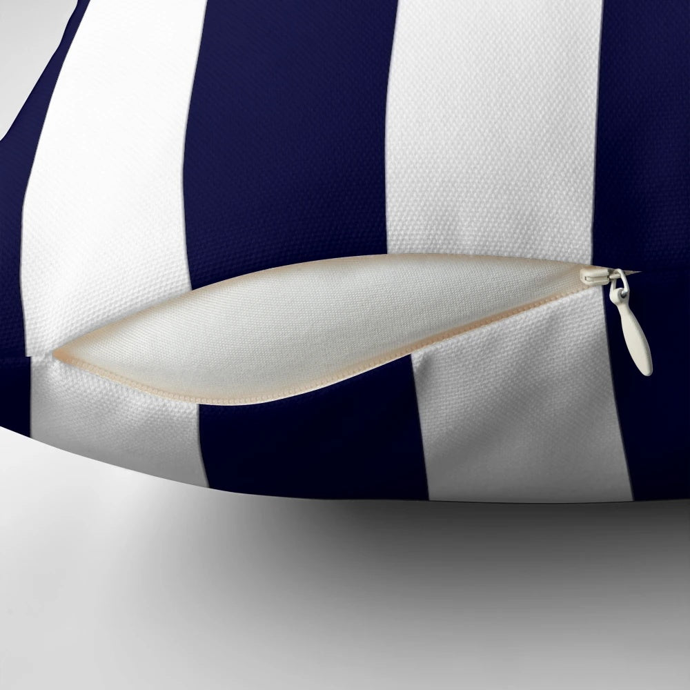 Navy blue and white striped decorative pillow for coastal and beach-inspired home decor