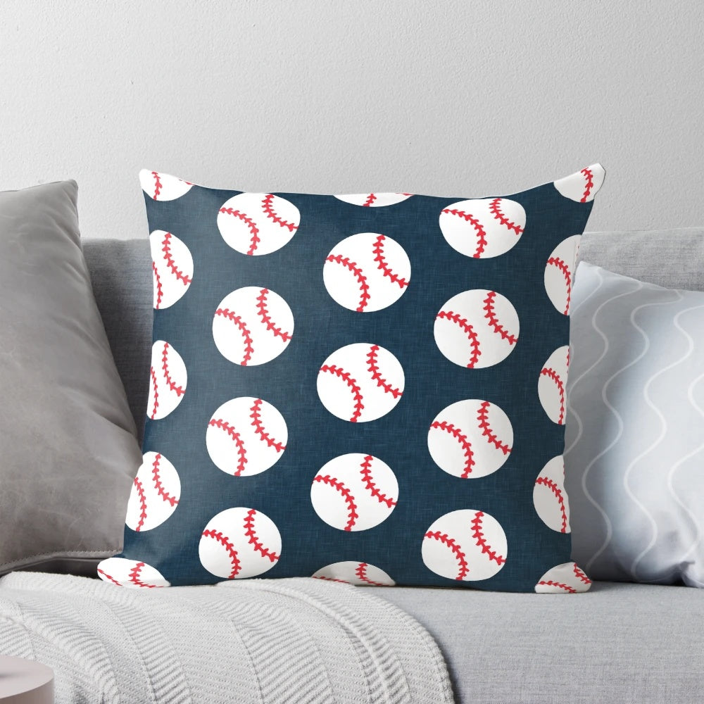 Navy blue baseball-themed pillow with baseball graphics on a dark blue background