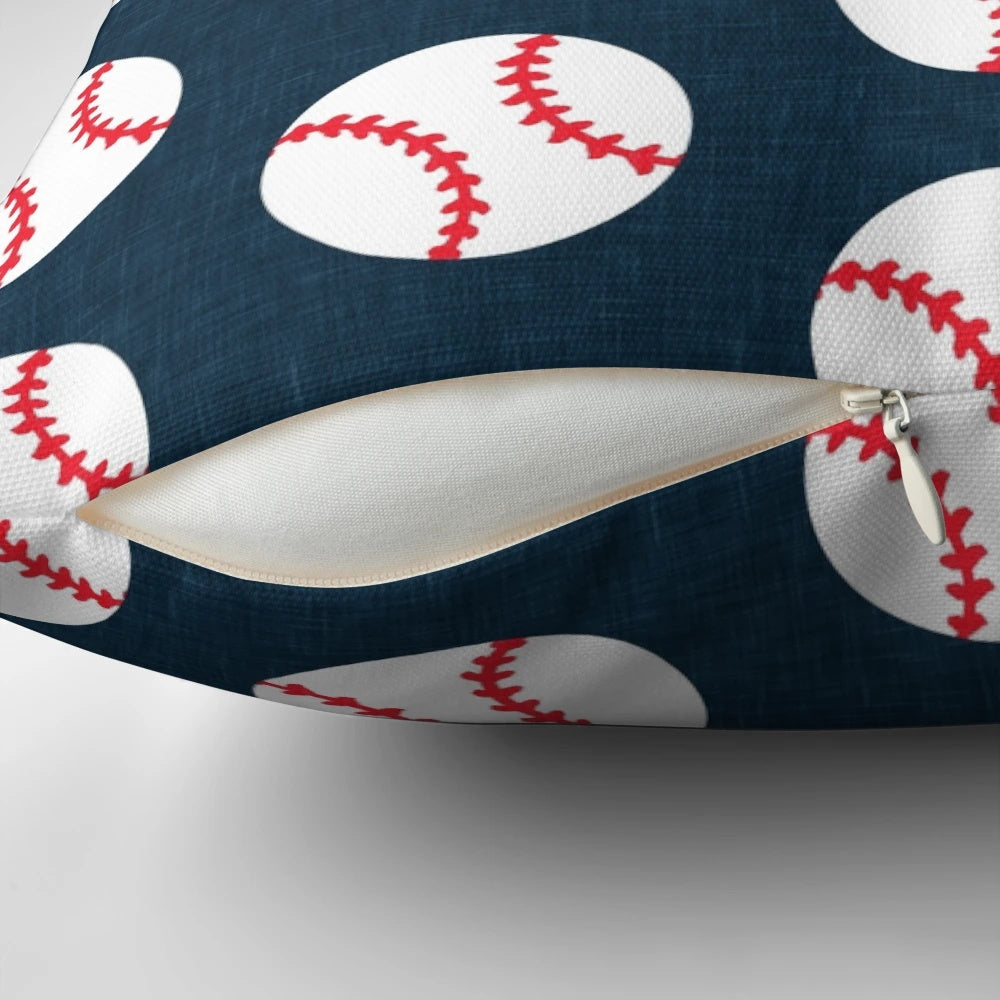 Navy blue baseball-themed pillow with baseball graphics on a dark blue background