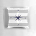 Navy blue compass motif on a silver gray and white striped decorative throw pillow.