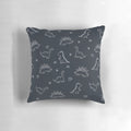 Navy blue dinosaur illustration printed on a plush, high-quality throw pillow