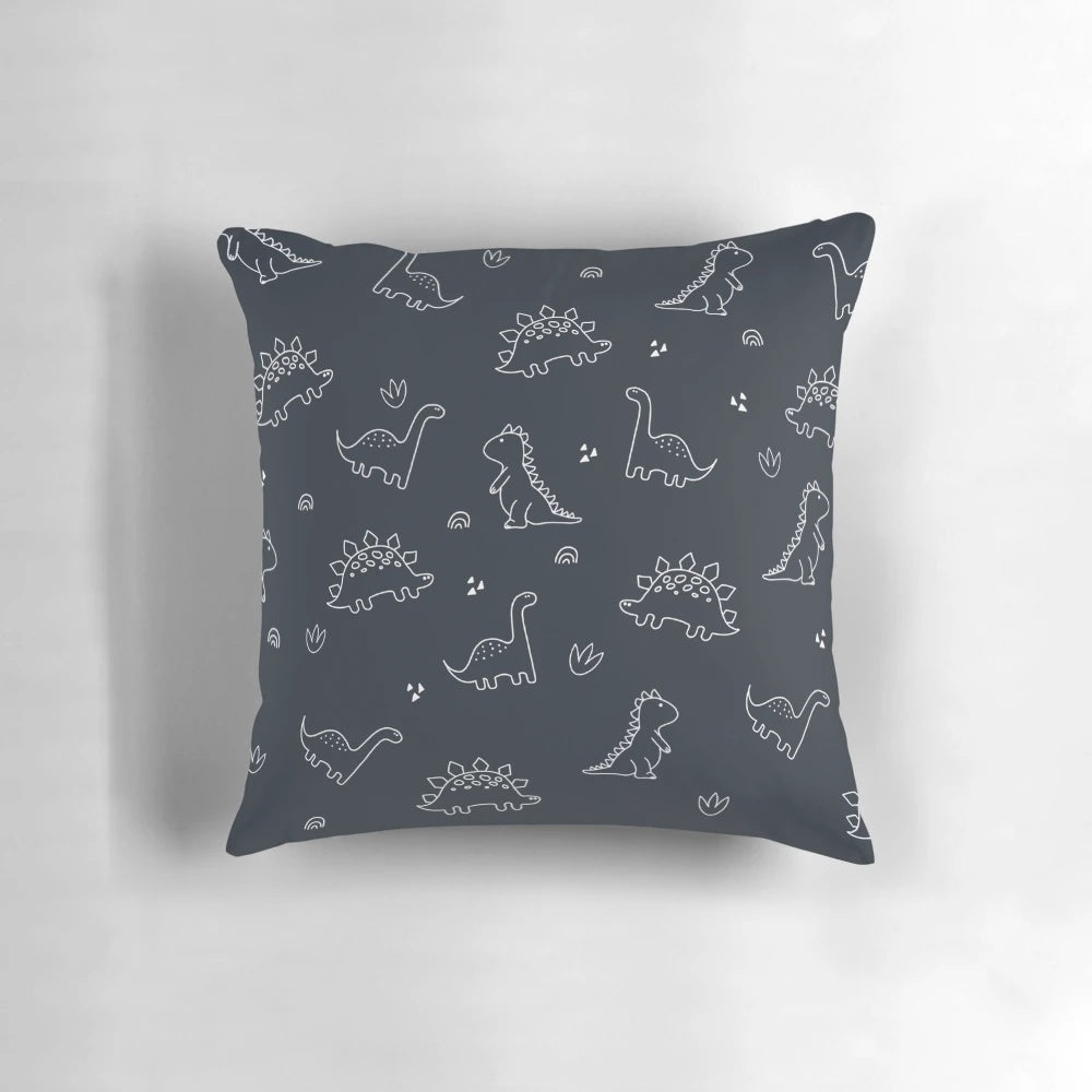 Navy blue dinosaur illustration printed on a plush, high-quality throw pillow