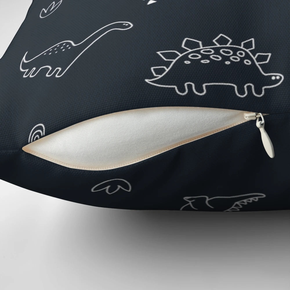 Navy blue dinosaur illustration printed on a plush, high-quality throw pillow