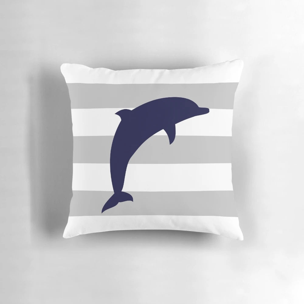 Navy blue dolphin jumping on a silver gray striped coastal throw pillow