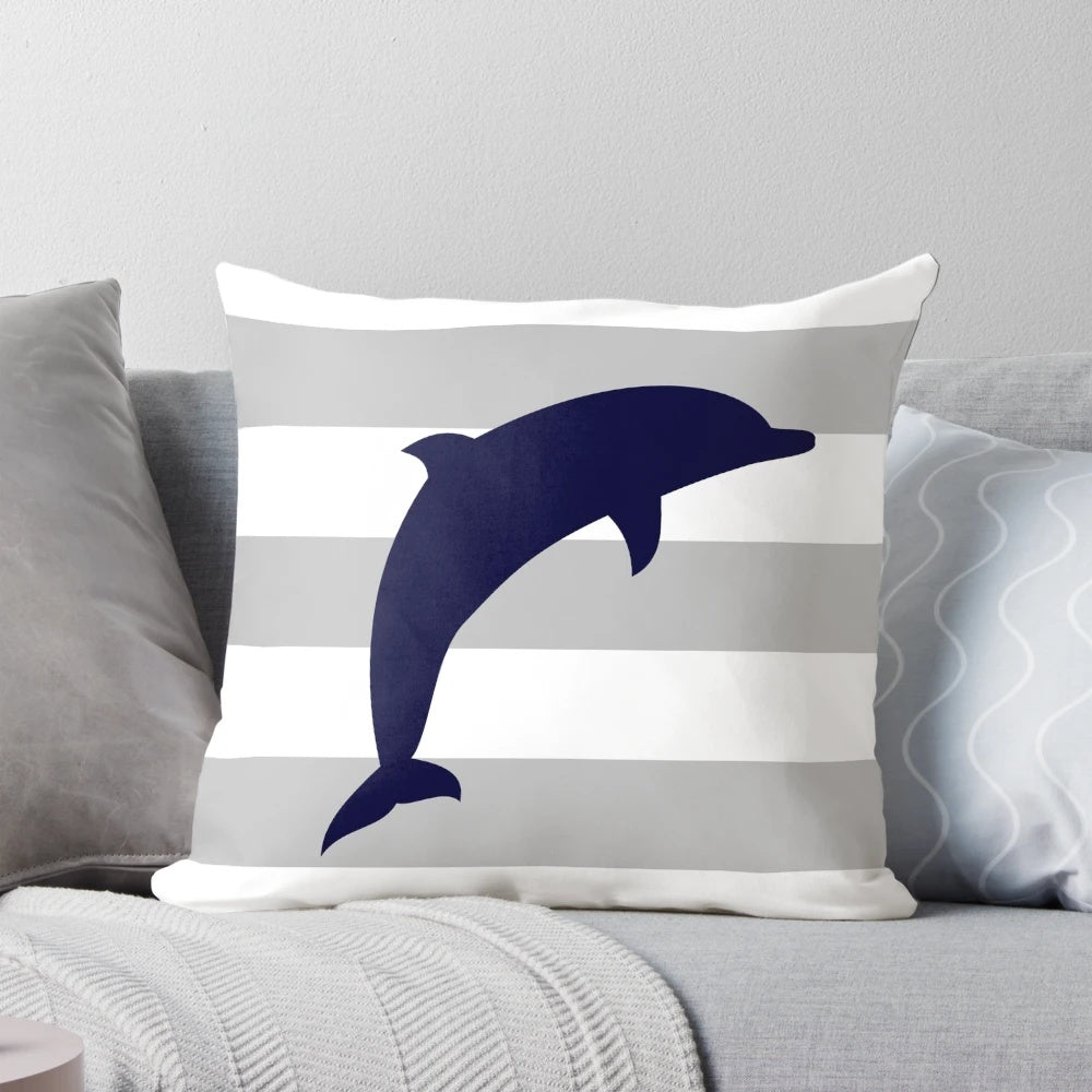 Navy blue dolphin jumping on a silver gray striped coastal throw pillow