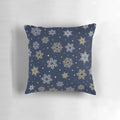 Navy blue pillow with elegant gold and silver snowflake design