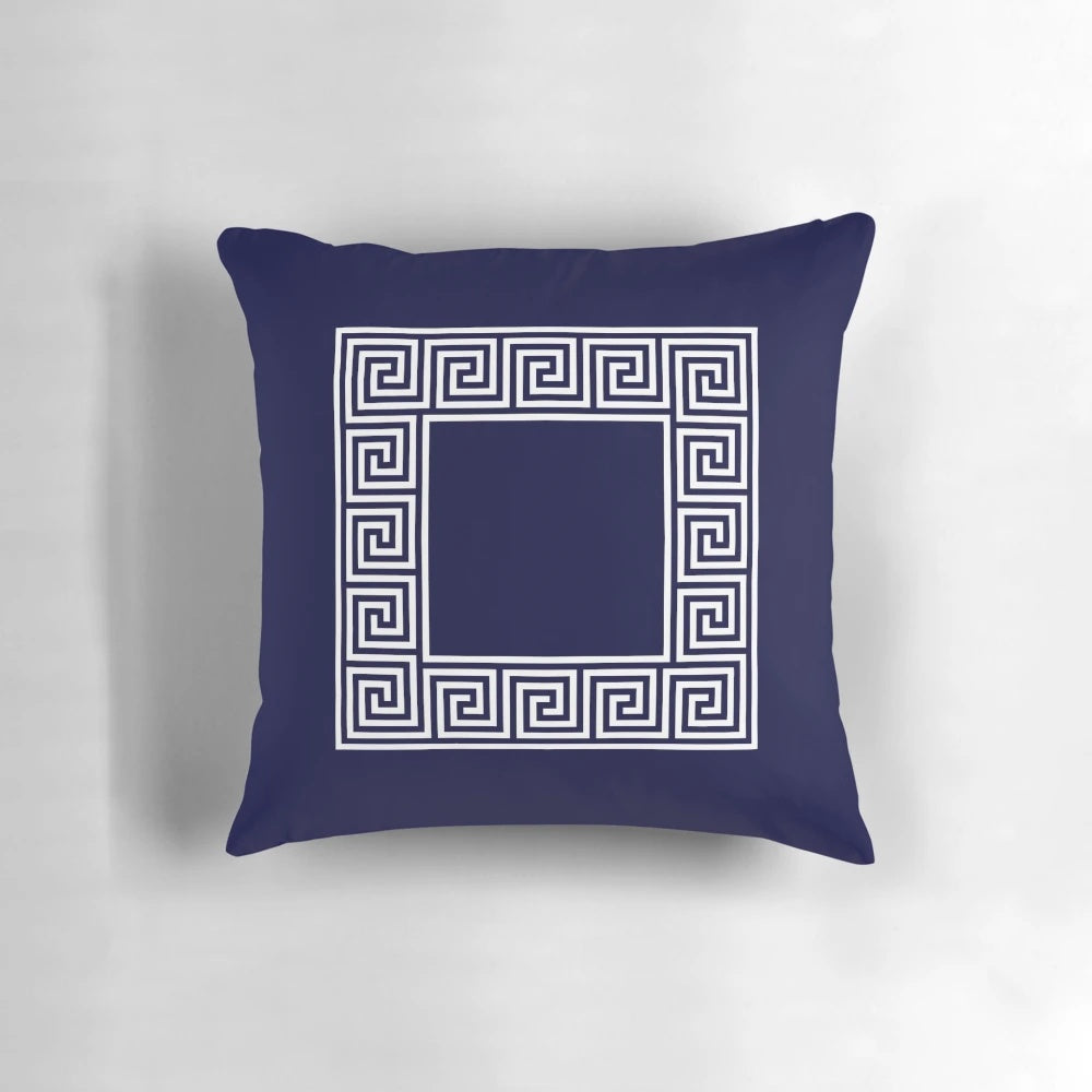 Navy blue square throw pillow with a classic Greek key meander border design