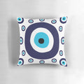 Navy blue and aqua pillow with a nazar evil eye lucky charm pattern