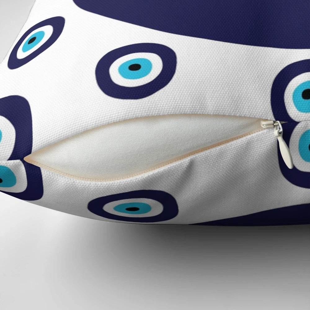Navy blue and aqua pillow with a nazar evil eye lucky charm pattern