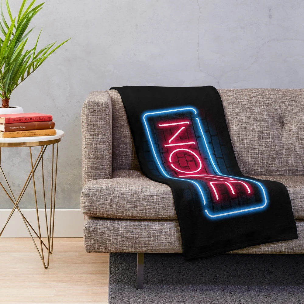 Neon "Nope" typography plush blanket for a cozy and entertaining home