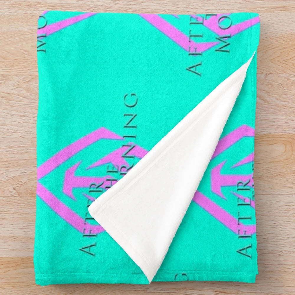 Neon pink and aqua plush blanket featuring the After the Mourning band logo
