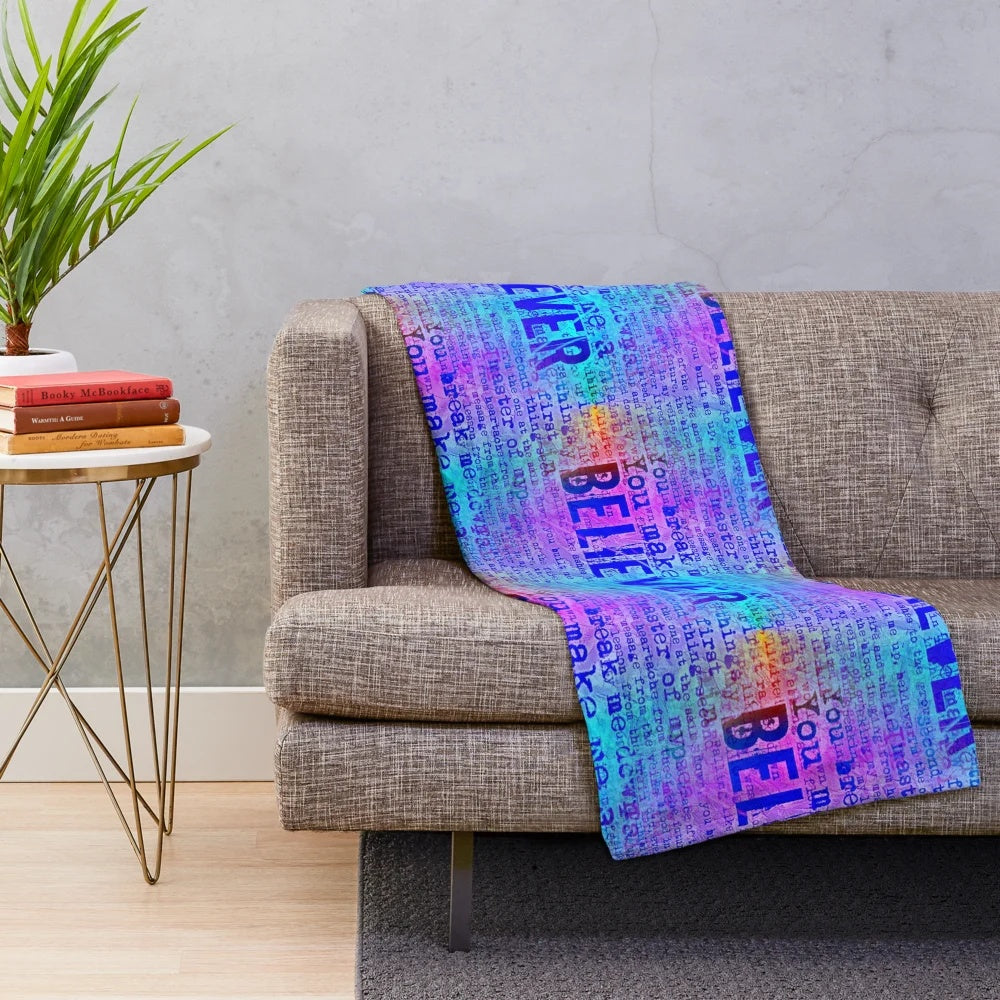 Neon rainbow-colored plush blanket with inspirational Imagine Dragons lyrics
