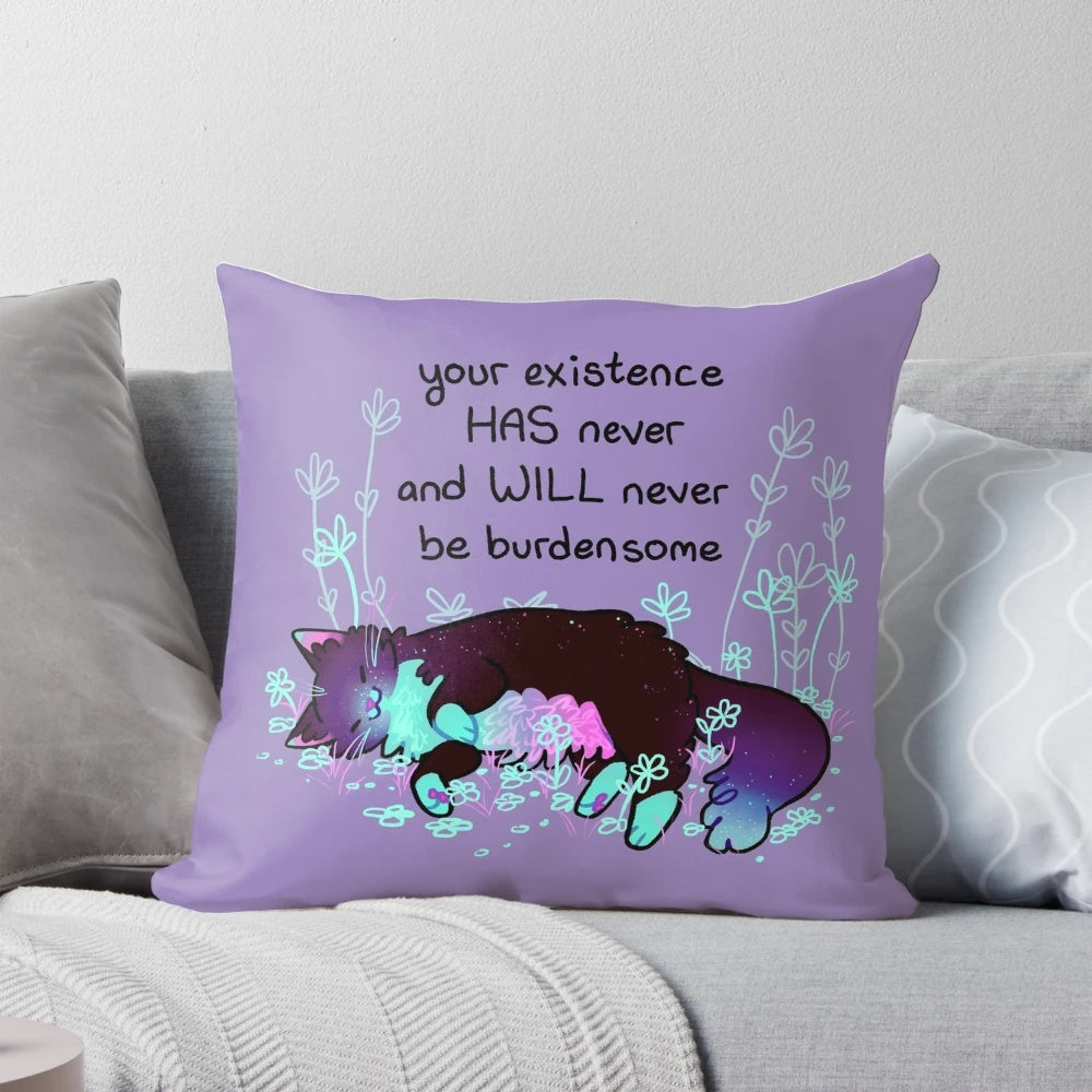 A neon-colored pillow featuring a cute, sleepy cat design for promoting mental wellness and self-acceptance.