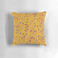 Yellow and blue neuron pattern pillow, showcasing the intricate design of brain cells and the central nervous system.