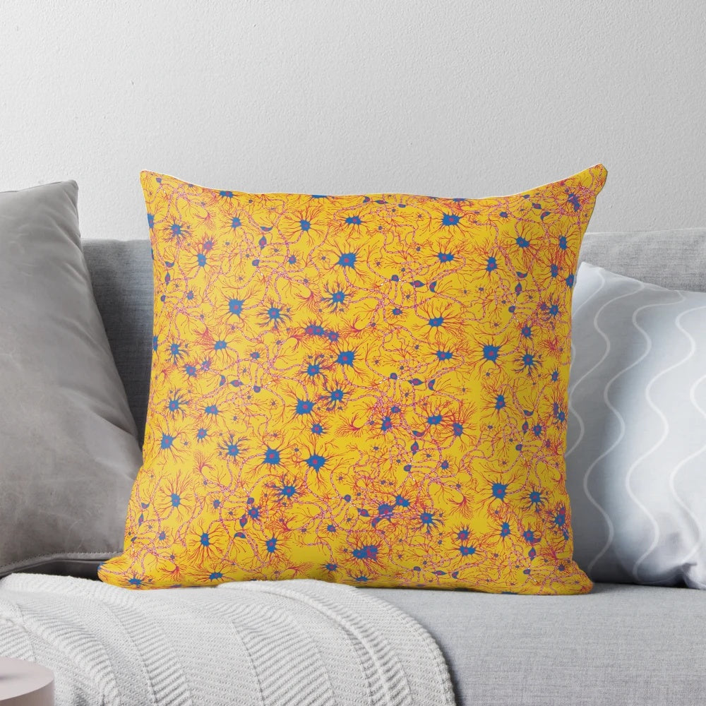 Yellow and blue neuron pattern pillow, showcasing the intricate design of brain cells and the central nervous system.