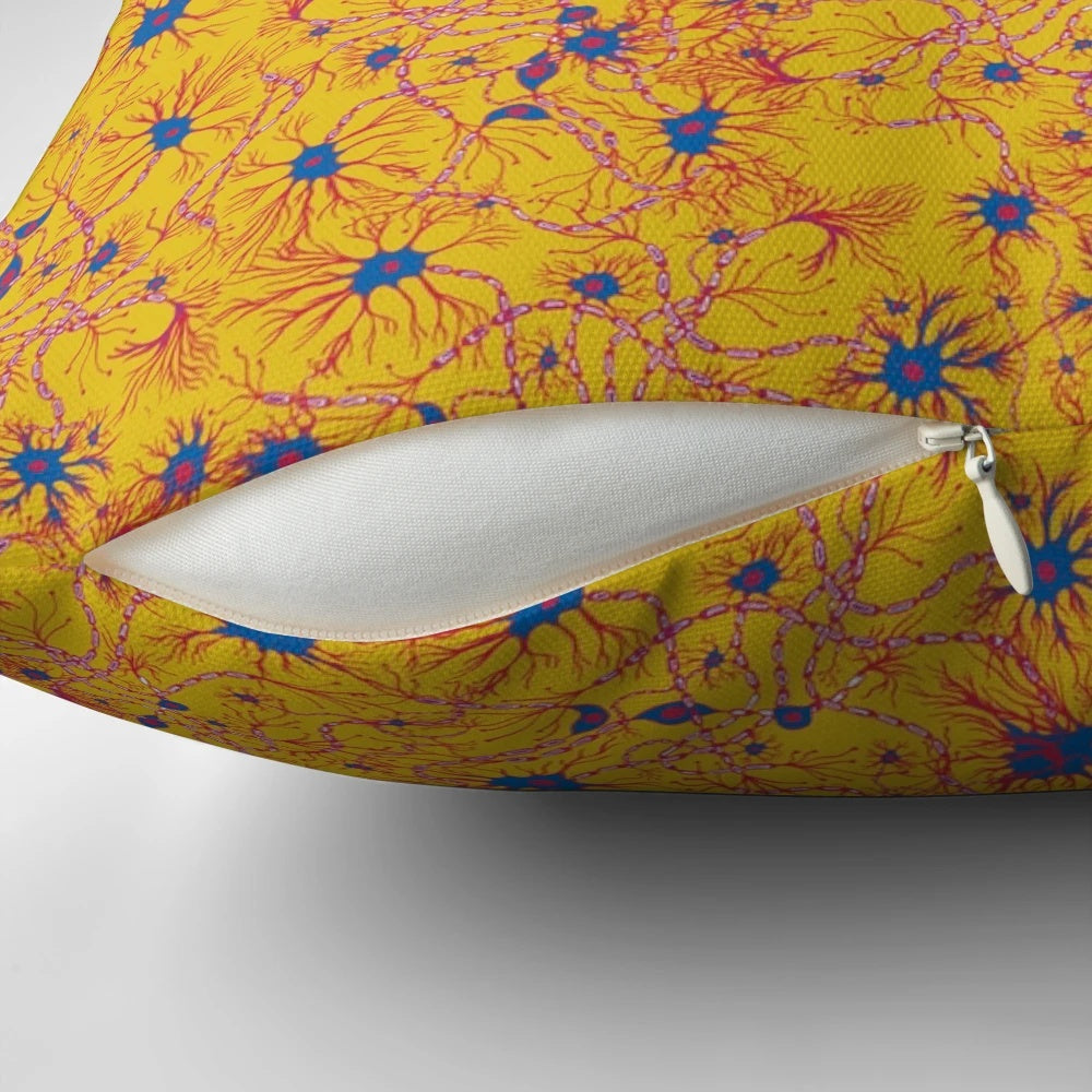 Yellow and blue neuron pattern pillow, showcasing the intricate design of brain cells and the central nervous system.