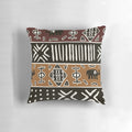 Neutral-toned pillow with a tribal African-inspired elephant pattern