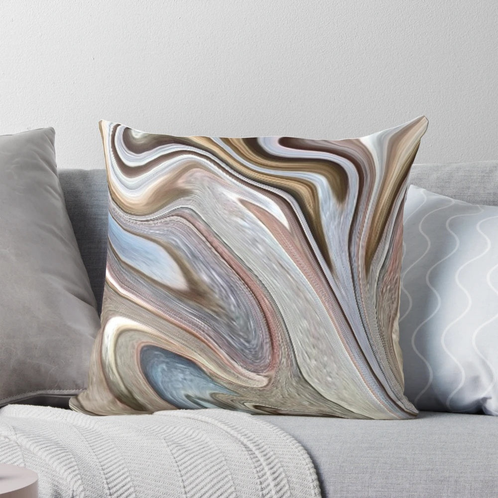 Neutral-colored pillow with abstract marble swirl pattern in shades of brown, tan, and grey, perfect for mid-century modern and boho-chic home decor.