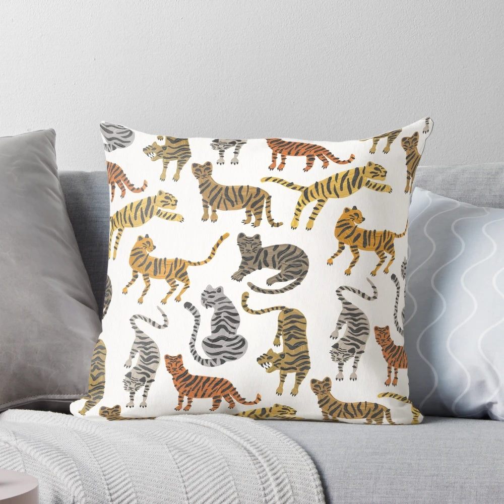 A neutral-toned pillow featuring a vibrant tiger design, perfect for jungle and safari-inspired home decor.