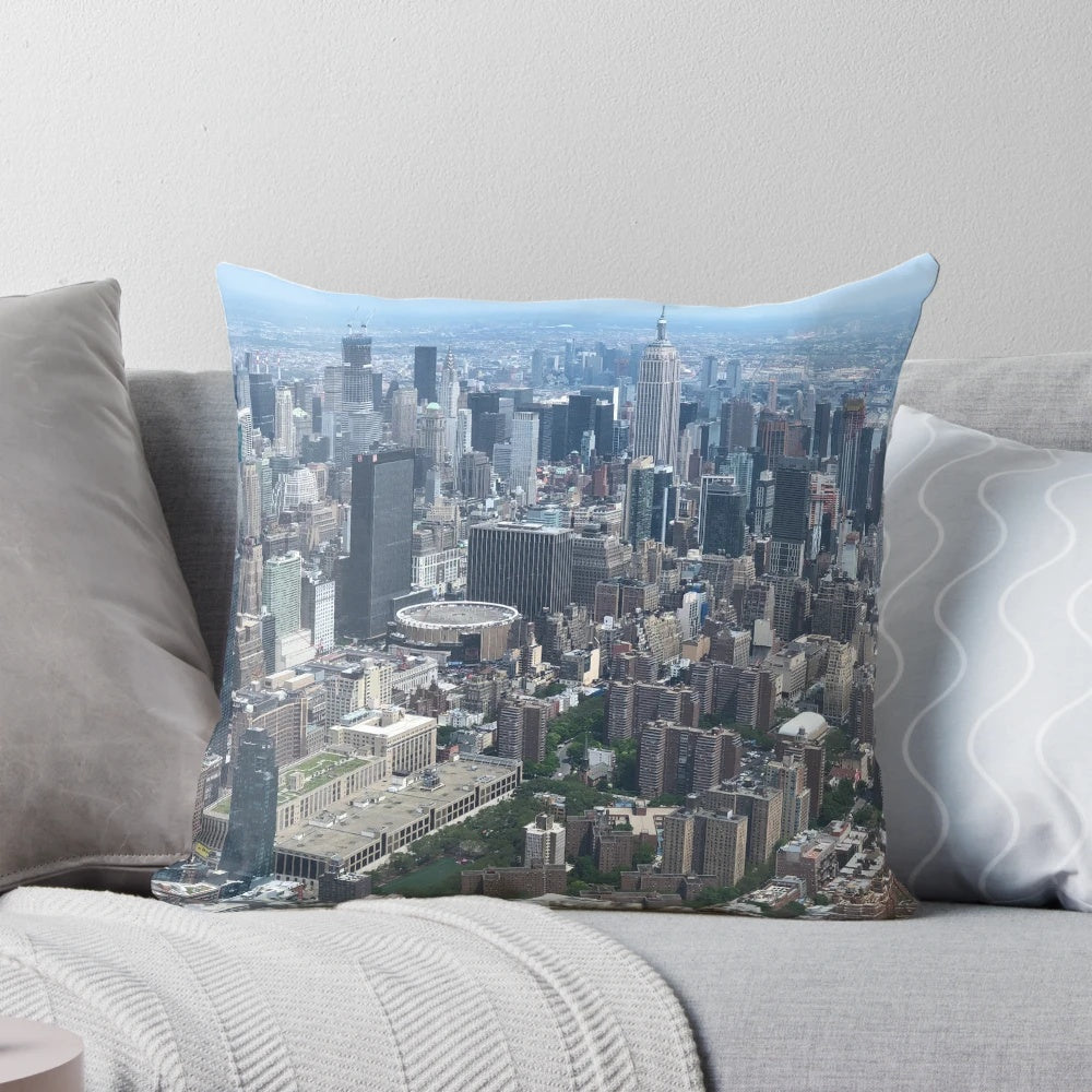 New York City skyline decorative pillow featuring high-rise buildings and concrete structures