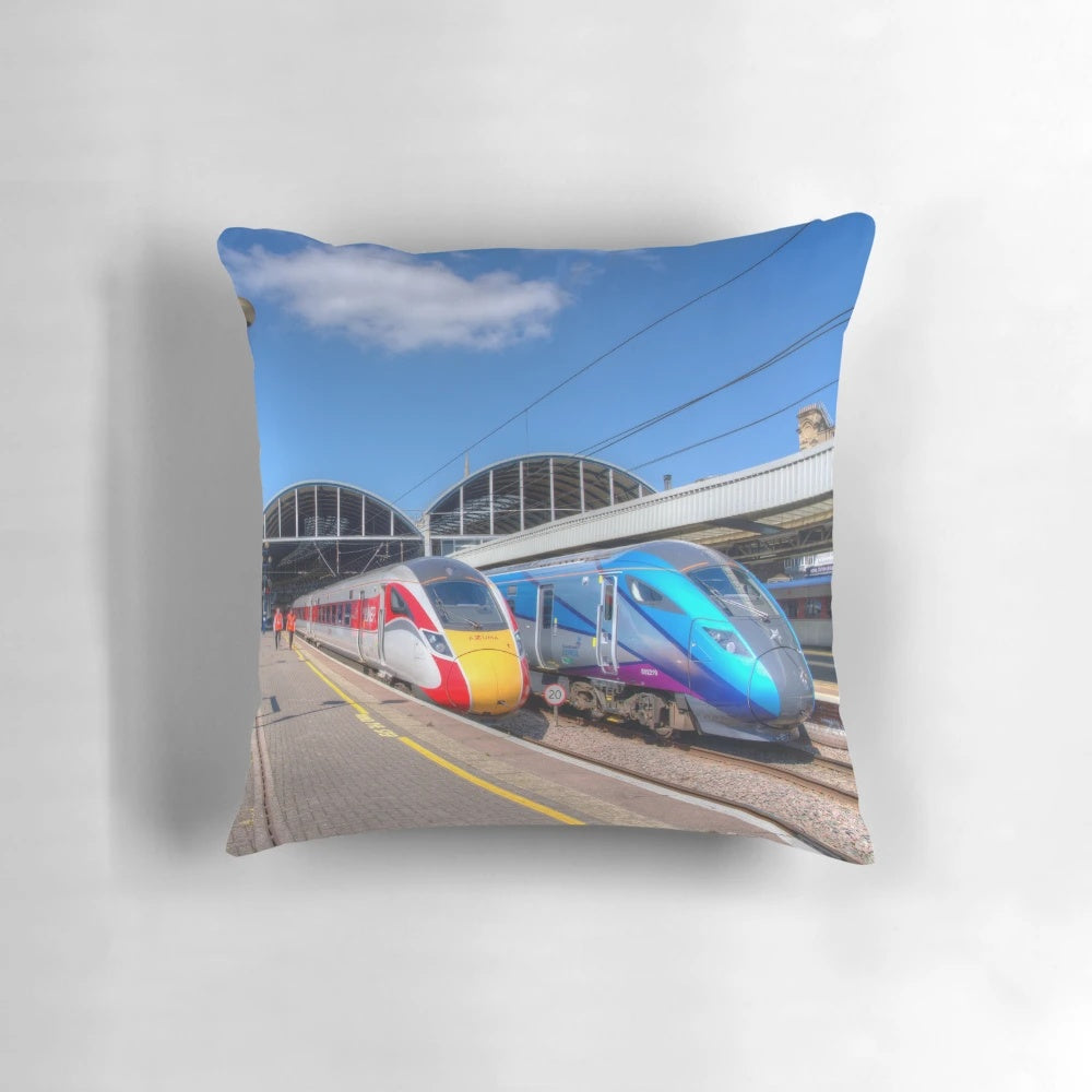 A high-quality pillow featuring a stunning HDR image of the Newcastle train station with a modern LNER Intercity Express train.