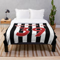 Newcastle United inspired plush blanket featuring midfielder Bruno Guimarães