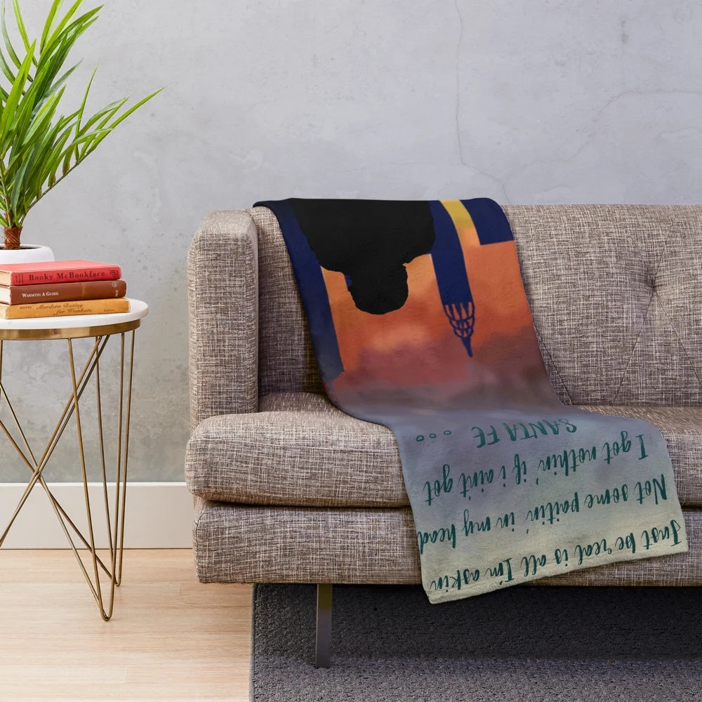 Newsies-inspired plush blanket with a Santa Fe design featuring the Broadway musical's logo