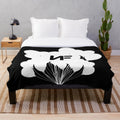 NF-inspired plush blanket featuring a white logo design