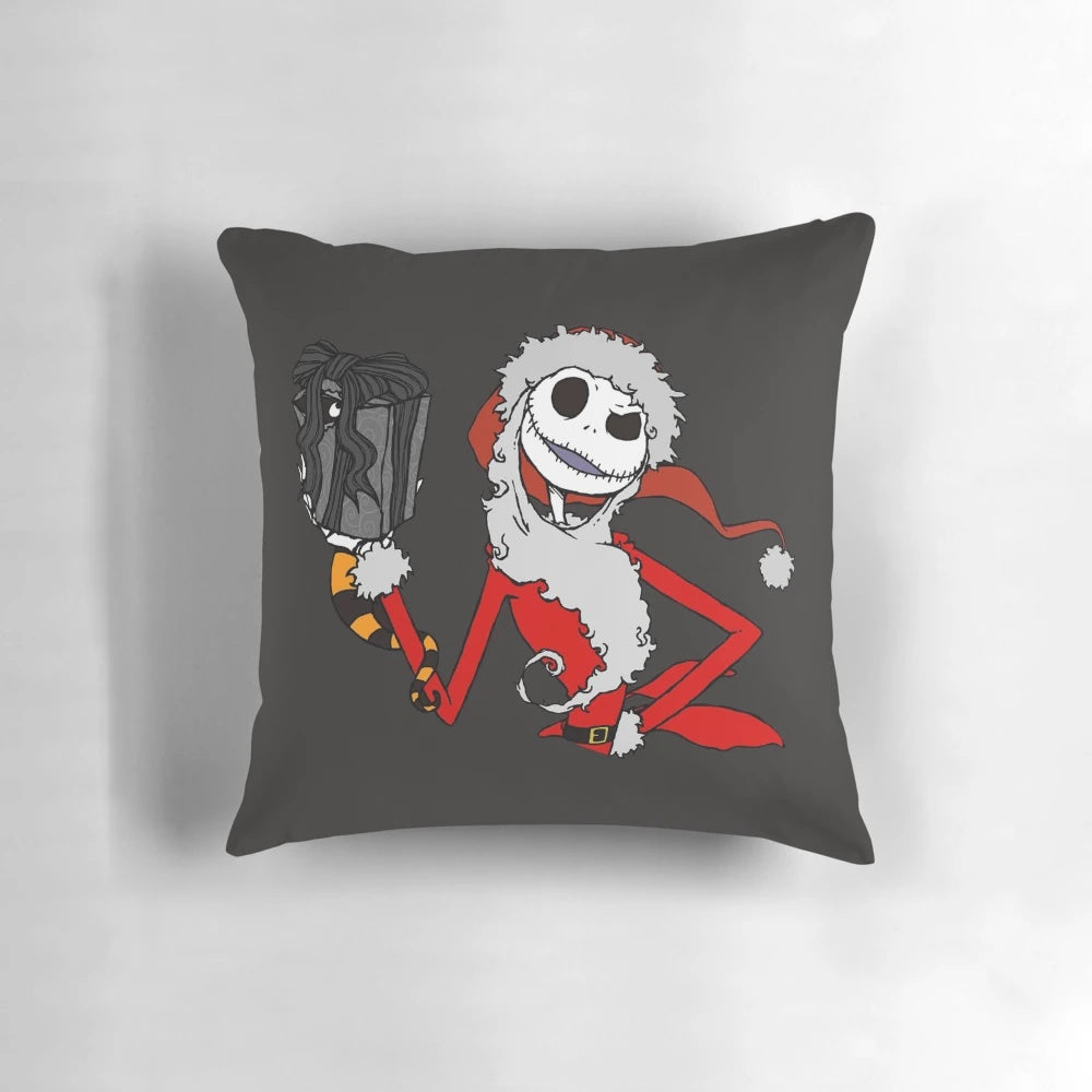 Nightmare Before Christmas-themed throw pillow with festive snow and characters