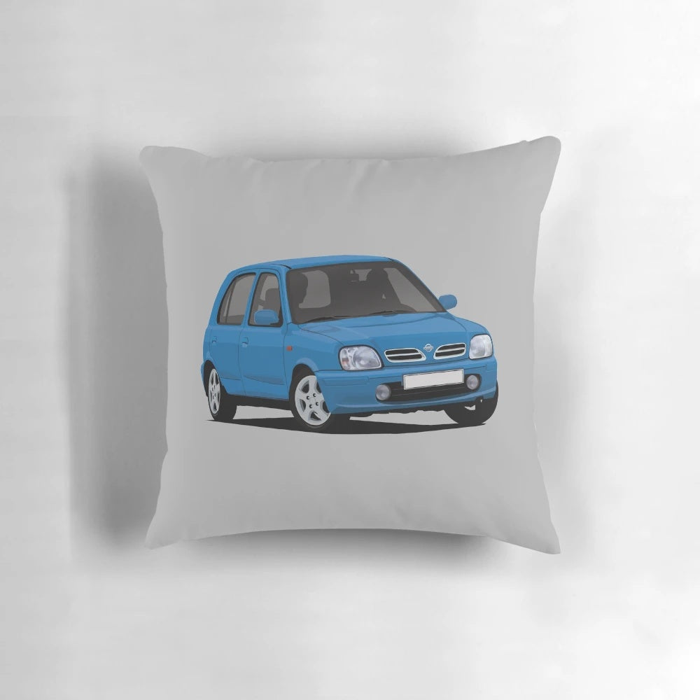 Nissan Micra K11C blue pillow illustration, featuring a classic Japanese supermini car from the 1990s