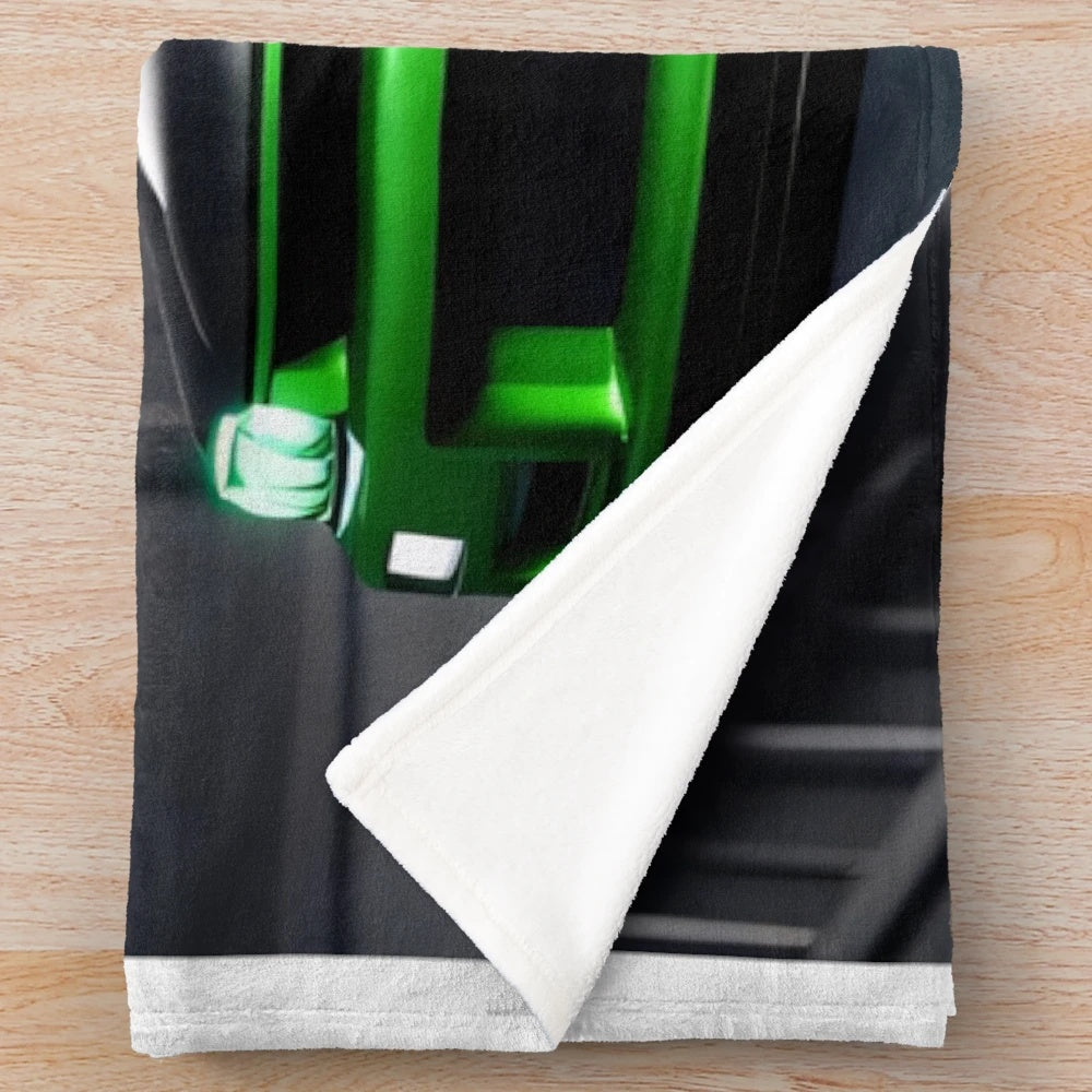 Nissan Skyline GTR 34 inspired plush throw blanket featuring a green sports car in a garage setting
