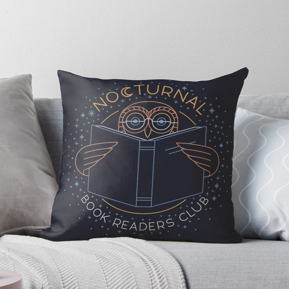 Cozy pillow with a starry owl design, perfect for nocturnal book readers