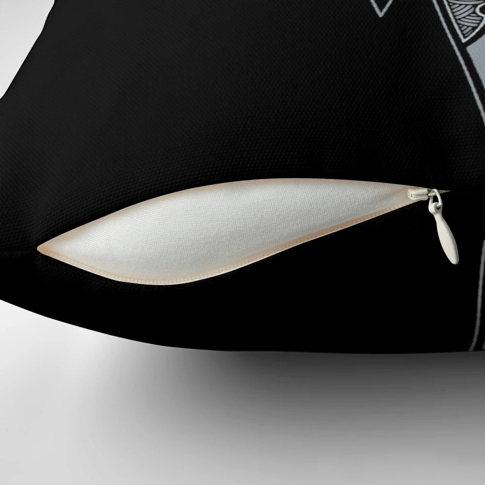A silver-colored pillow featuring a wolf graphic, inspired by Norse mythology and Scandinavian design.