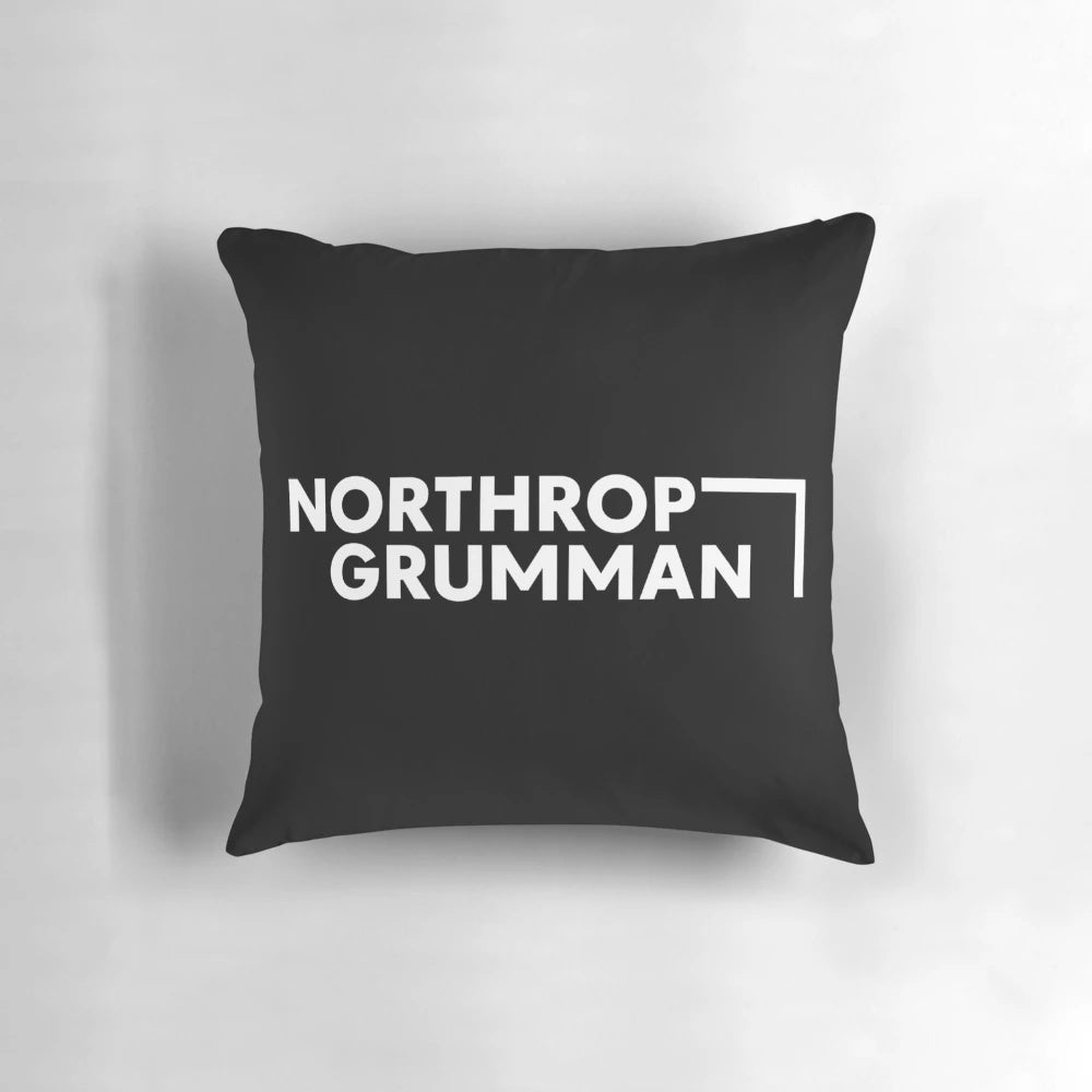 Northrop Grumman logo printed on a soft, plush pillow