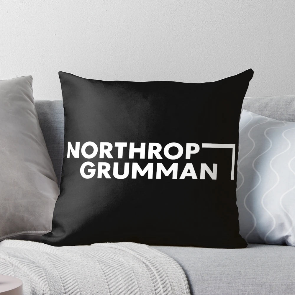 Northrop Grumman logo printed on a soft, plush pillow
