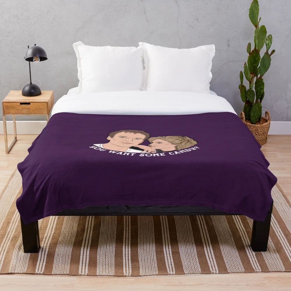 Plush blanket featuring Buffy the Vampire Slayer's Giles and Joyce's "Band Candy" design