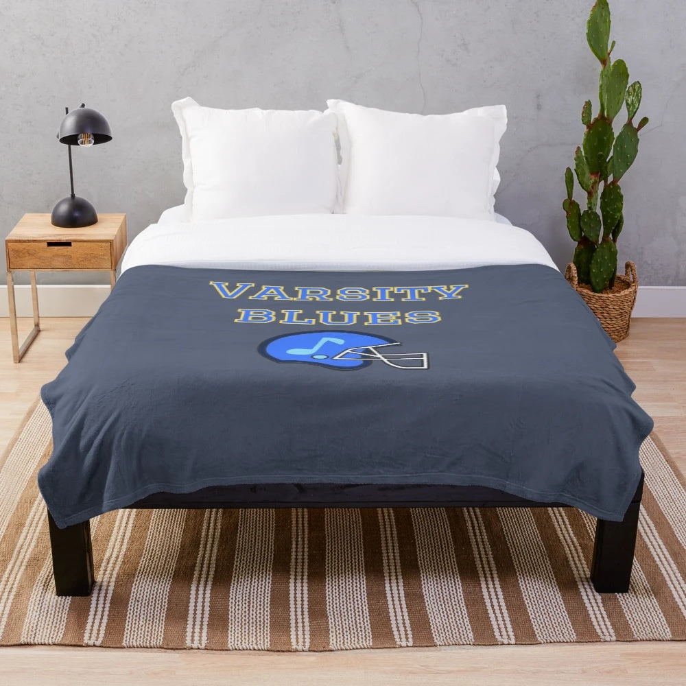 Plush blanket with varsity football and retro 90s design