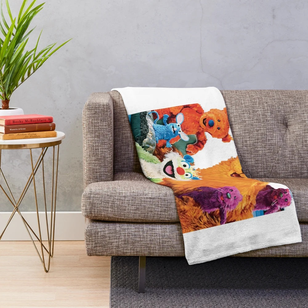 Cozy plush blanket featuring the characters from the beloved children's TV show 'Bear in the Big Blue House