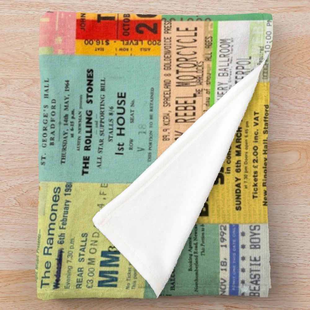 Plush blanket featuring vintage concert ticket stubs