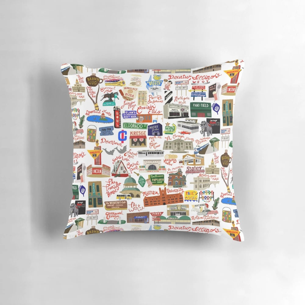 A cozy pillow featuring vintage landmarks and scenes from Decatur, Illinois.