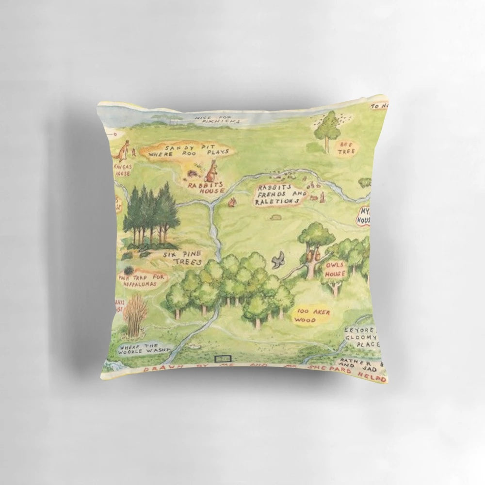 A cozy Hundred Acre Woods map pillow, featuring the beloved Winnie the Pooh characters.