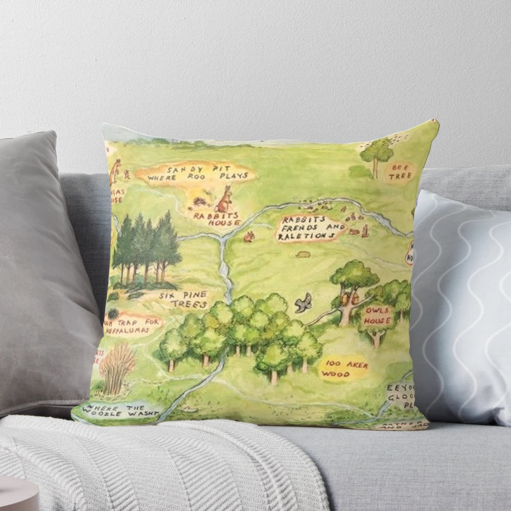 A cozy Hundred Acre Woods map pillow, featuring the beloved Winnie the Pooh characters.