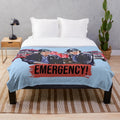 Plush blanket with paramedic-inspired design