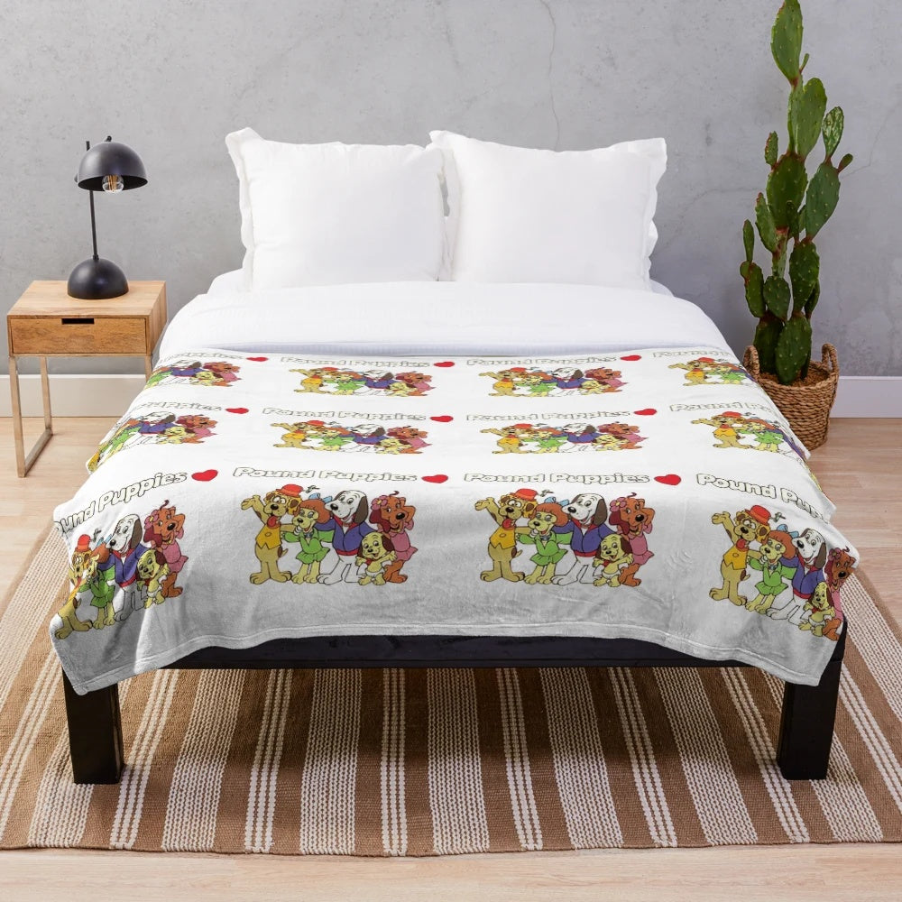 Plush blanket featuring Pound Puppies cartoon characters