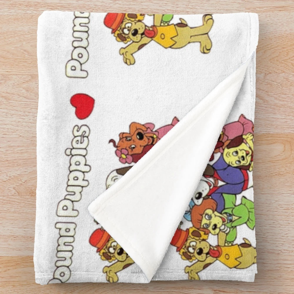 Plush blanket featuring Pound Puppies cartoon characters