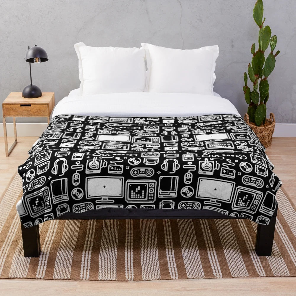 Retro gaming plush blanket featuring vintage video game consoles, controllers, and accessories