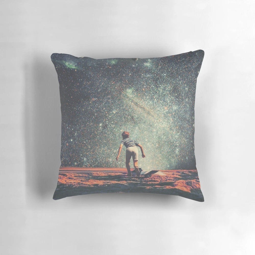 A colorful, vintage-inspired pillow featuring a collage of retro space and universe elements in a pop art style.